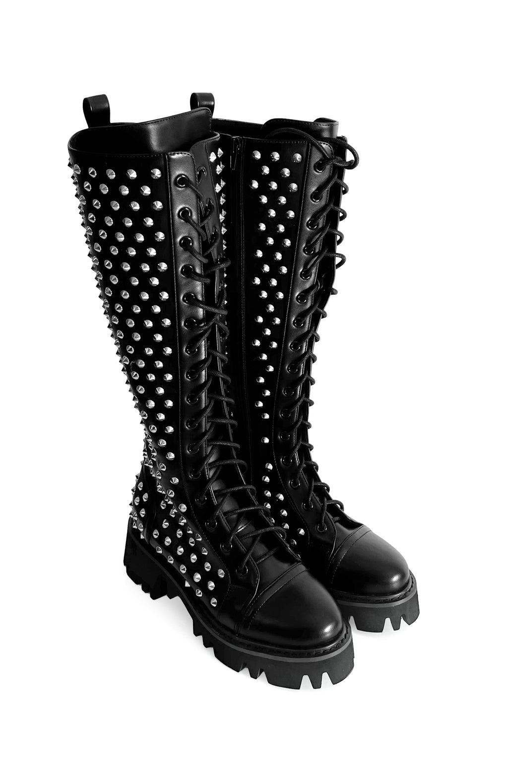 Women's black knee-high lace-up boots with silver studs and lugged soles