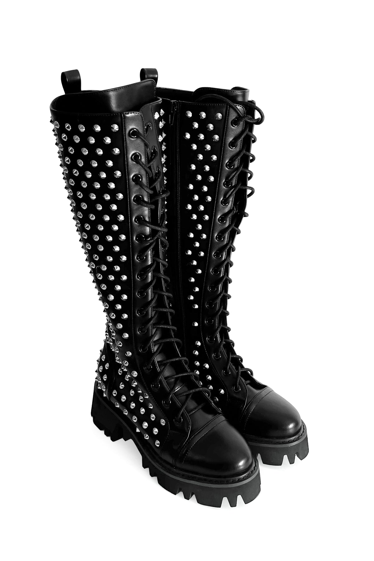 Women's black knee-high lace-up boots with silver studs and lugged soles