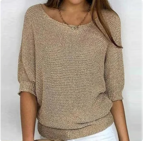 Women's textured knit sweater with round neck and three quarter sleeves