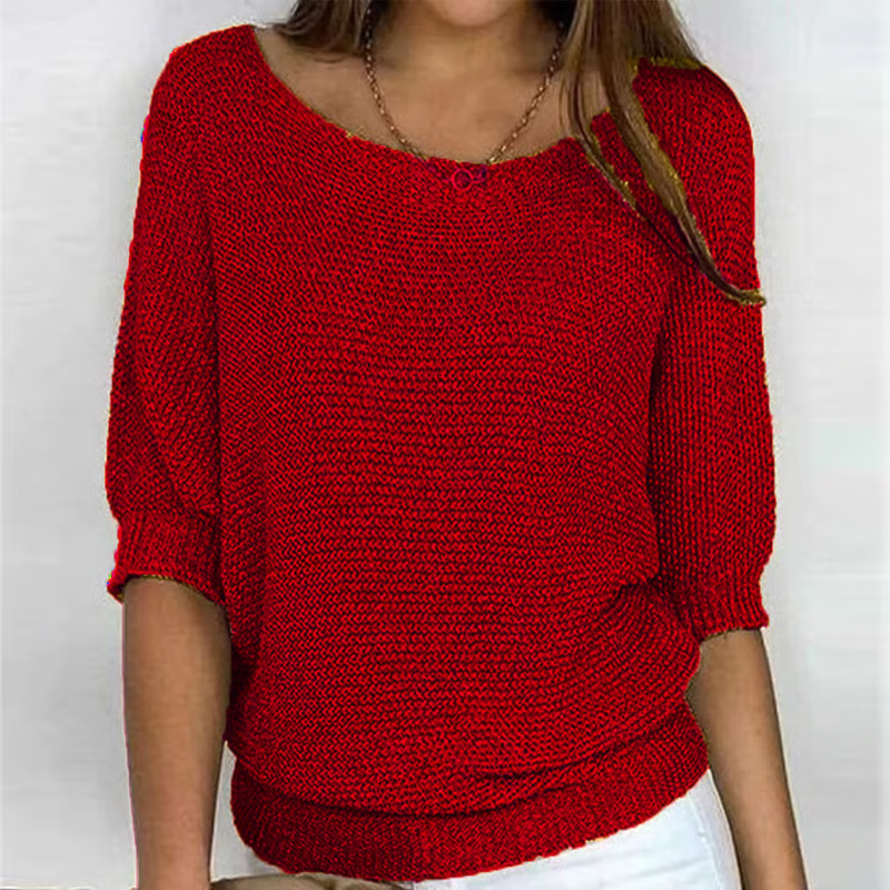Women's textured knit sweater with round neck and three quarter sleeves
