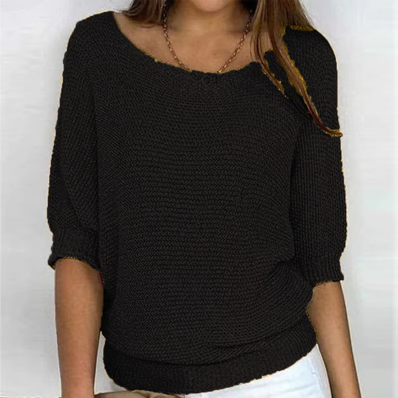 Women's textured knit sweater with round neck and three quarter sleeves