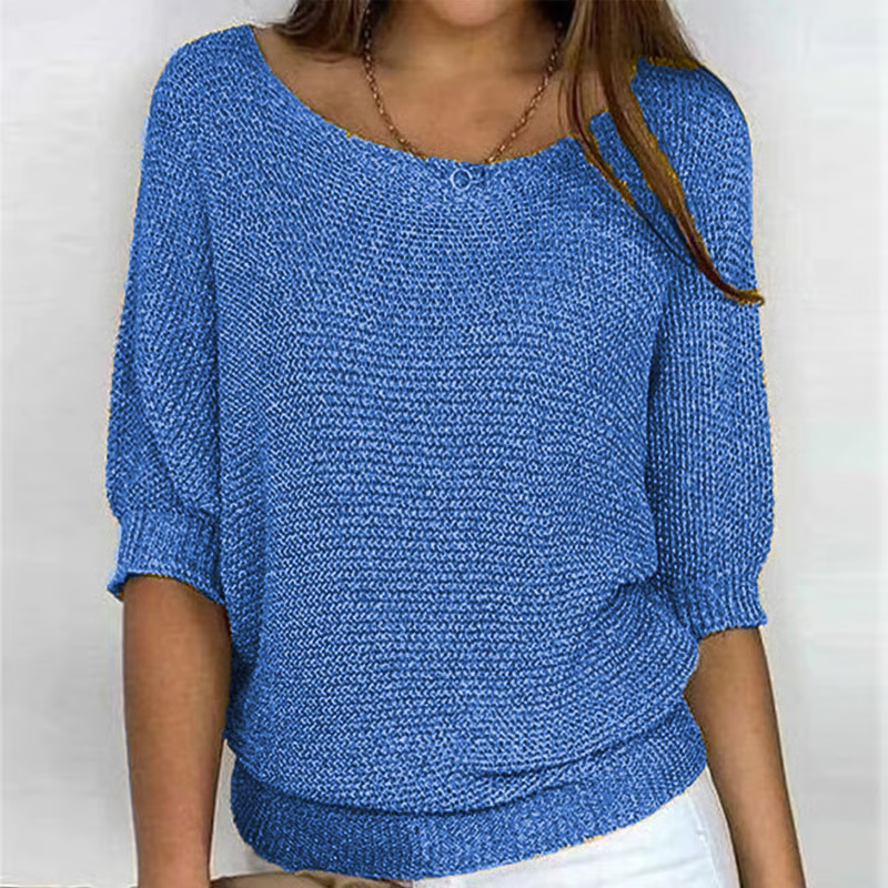 Women's textured knit sweater with round neck and three quarter sleeves