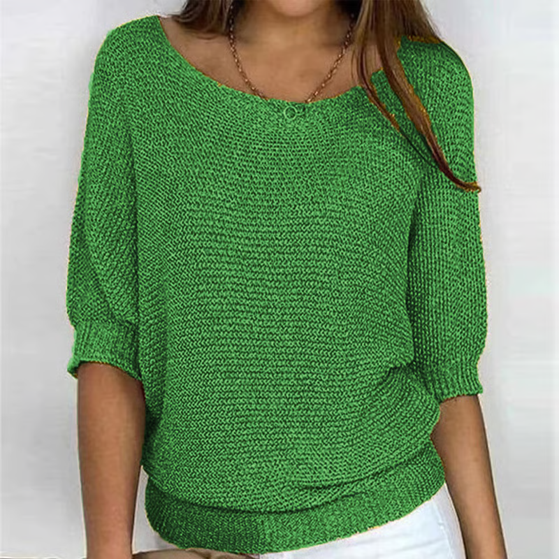 Women's textured knit sweater with round neck and three quarter sleeves