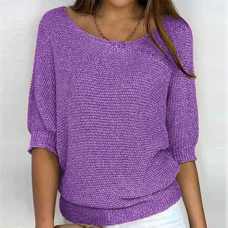 Women's textured knit sweater with round neck and three quarter sleeves