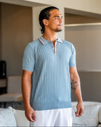 Men's short-sleeved textured knit polo shirt with contrast collar trim and button placket