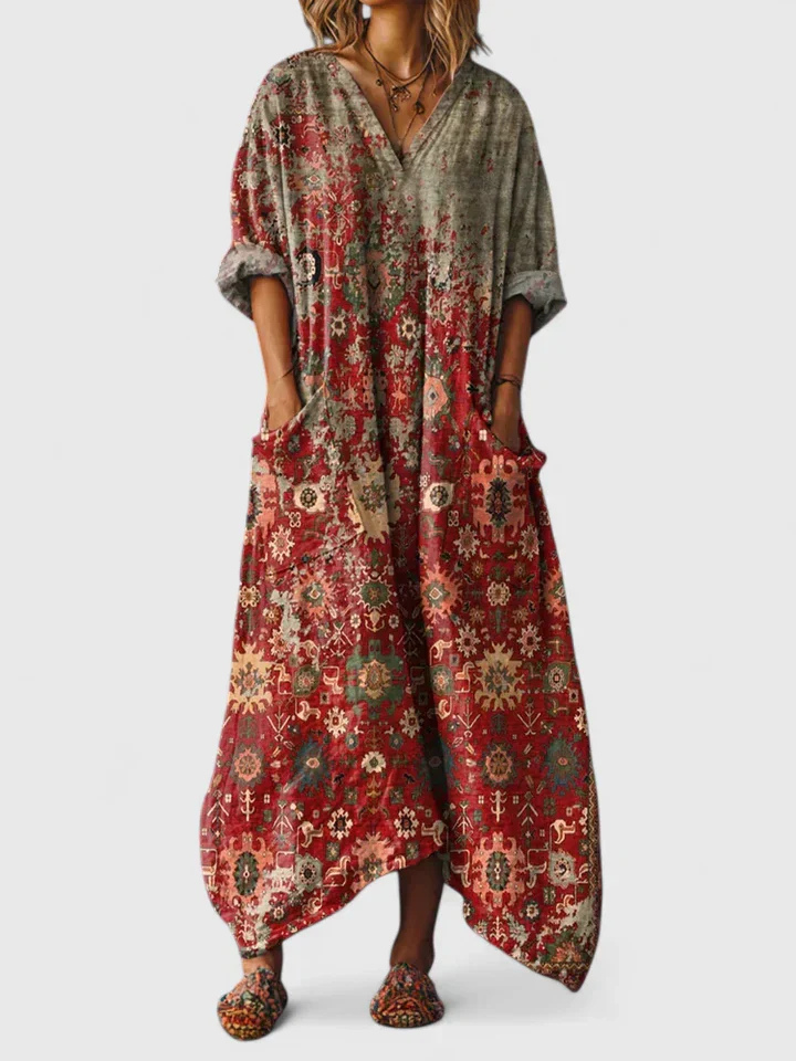 Women's boho print maxi dress in orange with front pockets, V-neck and three-quarter sleeves