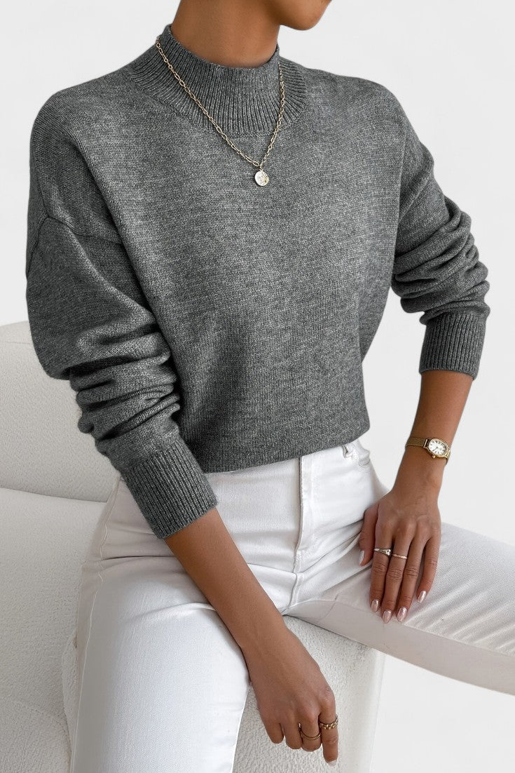 Women's mock neck sweater with long sleeves and ribbed trims