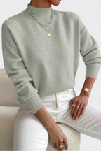 Women's mock neck sweater with long sleeves and ribbed trims