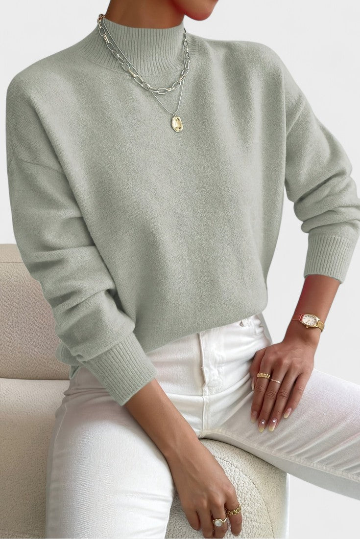Women's mock neck sweater with long sleeves and ribbed trims