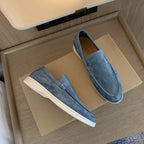 Slip-on loafers with moc toe detail and flat soles