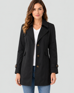Women's short trench coat with lapels, buttons and cuff straps