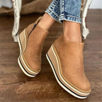 Women's ankle wedge boots with side zipper and layered platform sole