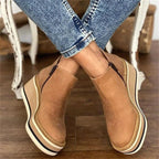 Women's ankle wedge boots with side zipper and layered platform sole