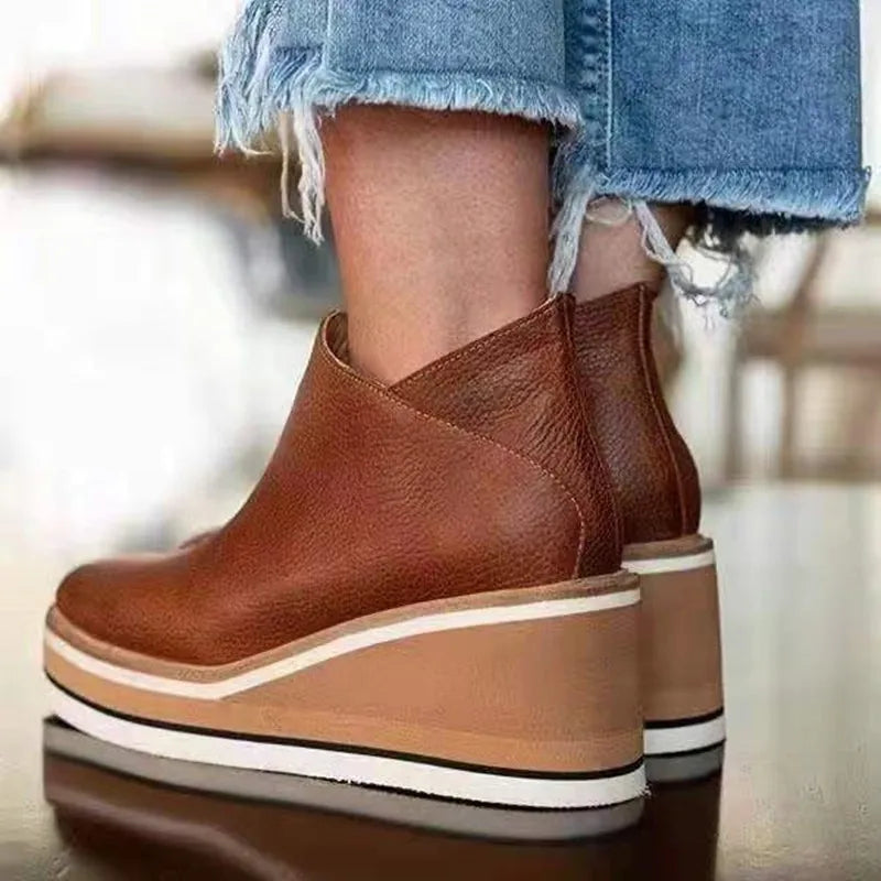 Women's ankle wedge boots with side zipper and layered platform sole