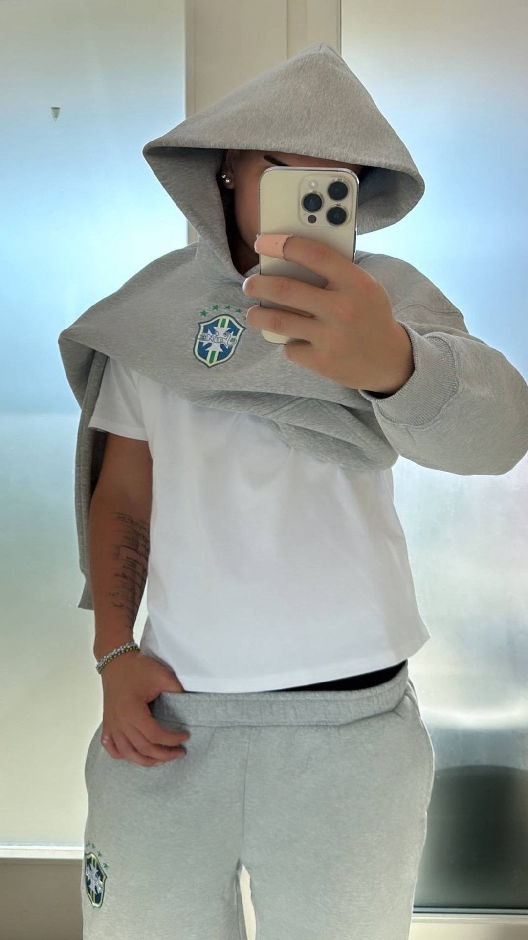 Men's hooded tracksuit set with crest details, pouch pocket and jogger trousers