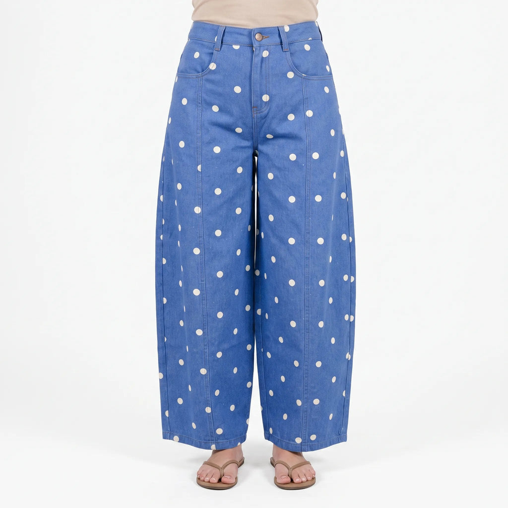 Women's high waist barrel leg jeans with an all-over polka dot pattern