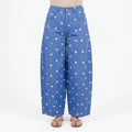 Women's high waist barrel leg jeans with an all-over polka dot pattern
