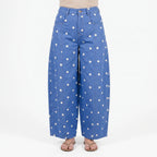 Women's high waist barrel leg jeans with an all-over polka dot pattern