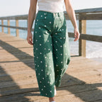 Women's high waist barrel leg jeans with an all-over polka dot pattern