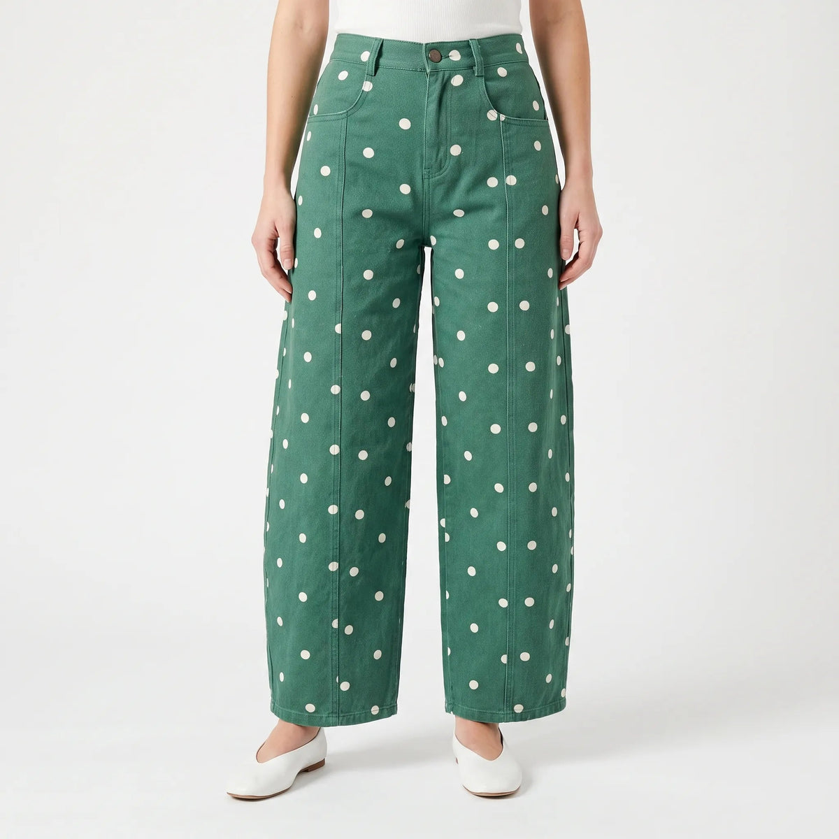 Women's high waist barrel leg jeans with an all-over polka dot pattern