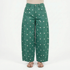Women's high waist barrel leg jeans with an all-over polka dot pattern