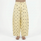 Women's high waist barrel leg jeans with an all-over polka dot pattern
