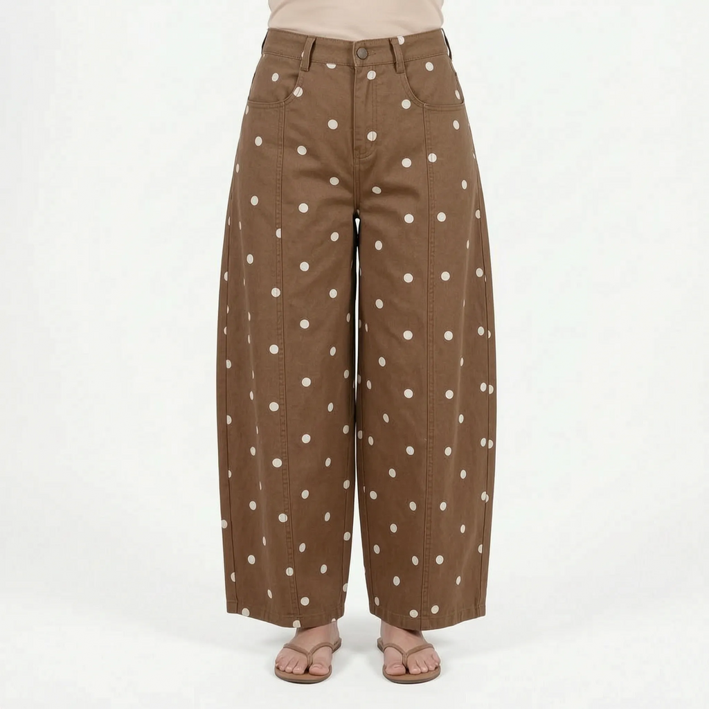 Women's high waist barrel leg jeans with an all-over polka dot pattern
