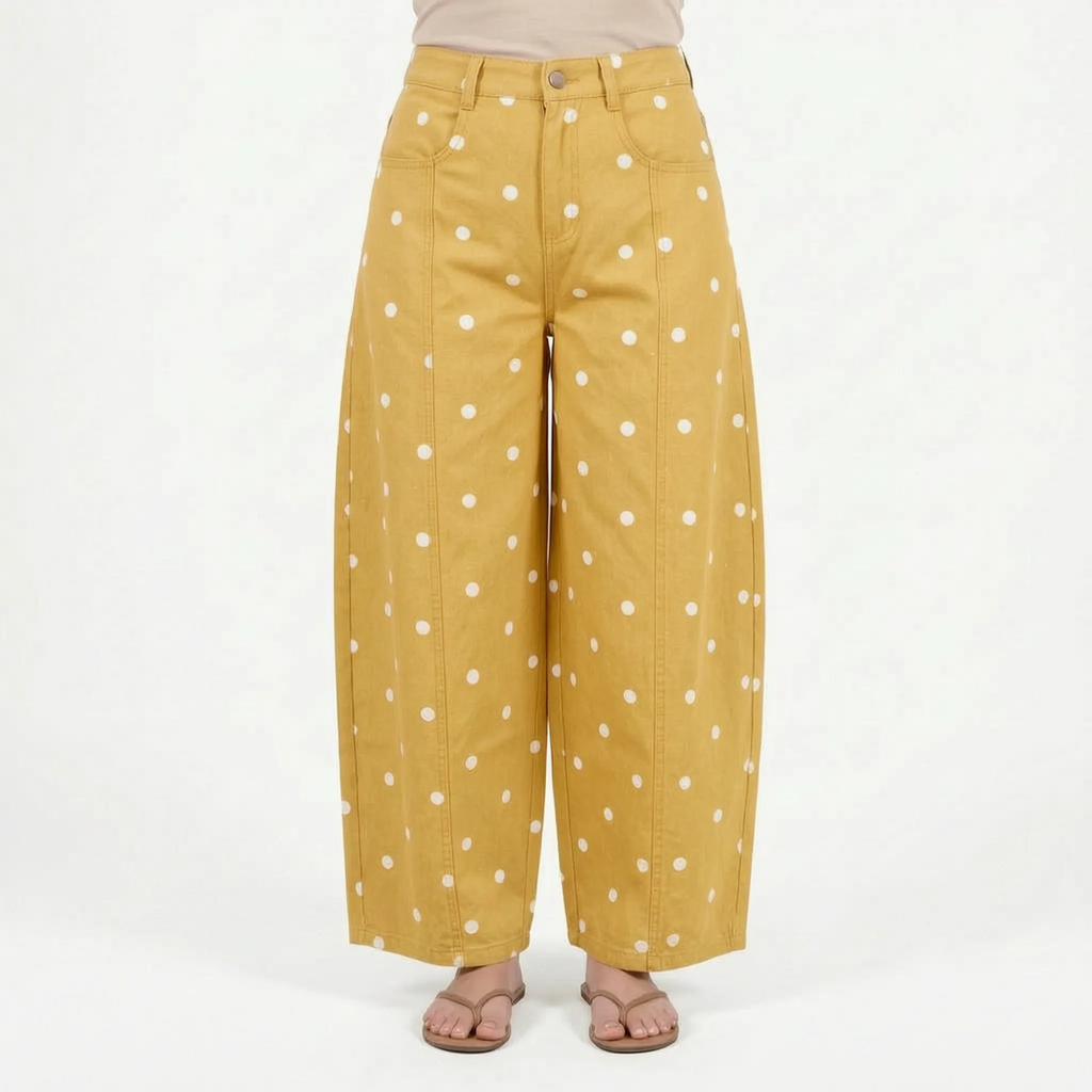 Women's high waist barrel leg jeans with an all-over polka dot pattern