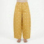 Women's high waist barrel leg jeans with an all-over polka dot pattern