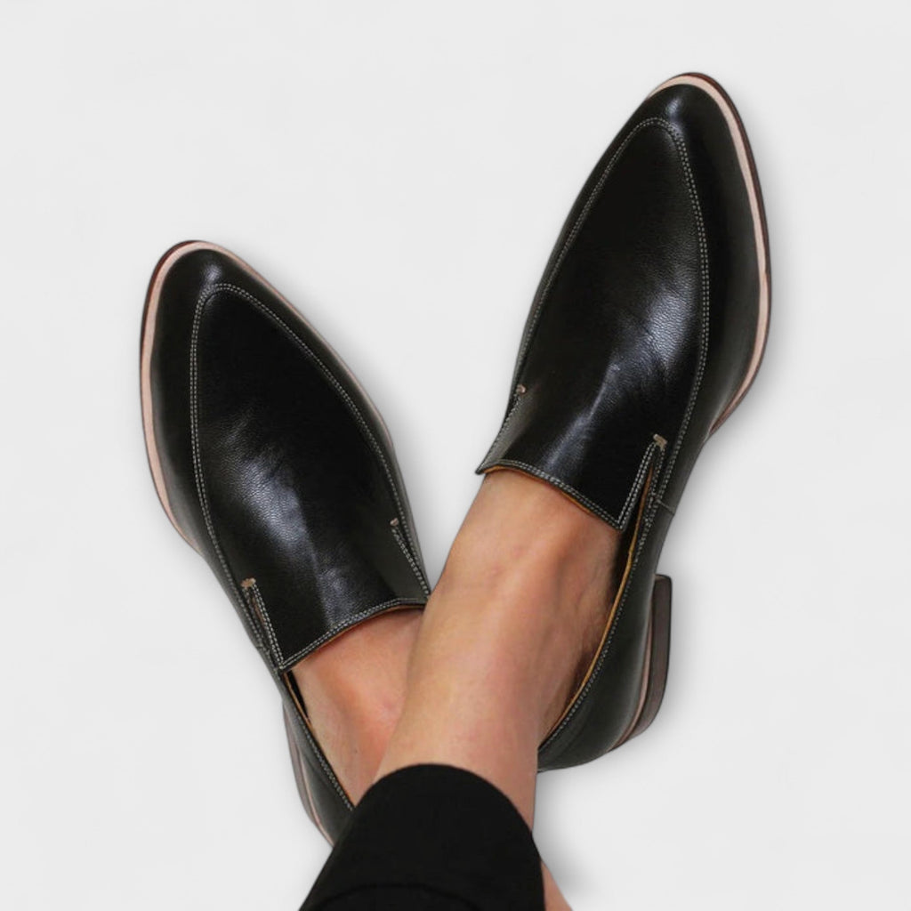 Women's black pointed slip-on loafers with low heels