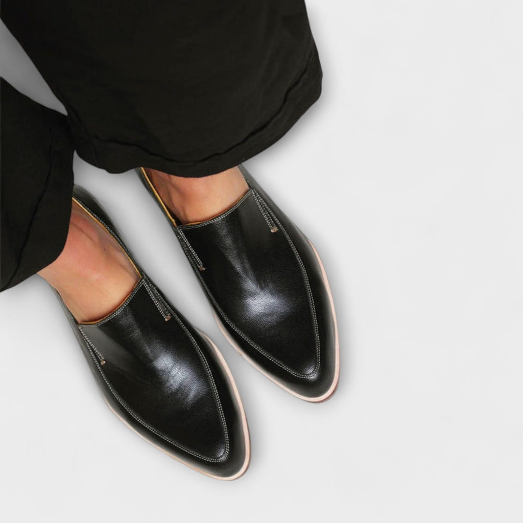 Women's black pointed slip-on loafers with low heels