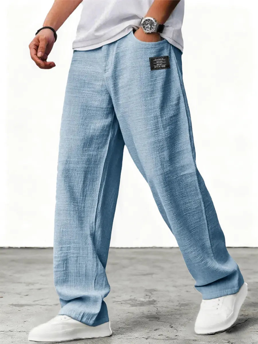 Men's relaxed wide-leg trousers with textured finish