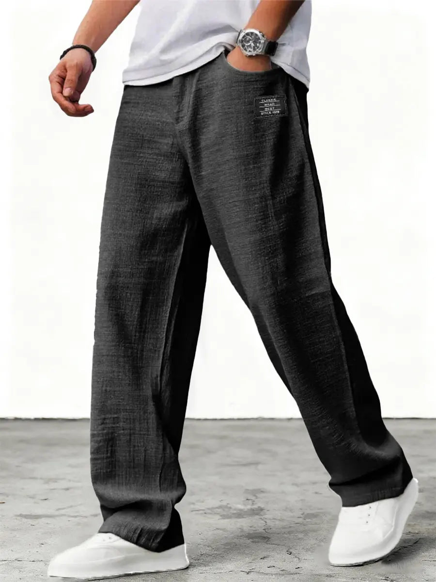 Men's relaxed wide-leg trousers with textured finish
