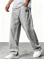 Men's relaxed wide-leg trousers with textured finish