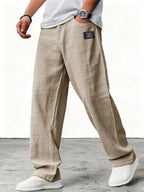 Men's relaxed wide-leg trousers with textured finish