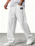 Men's relaxed wide-leg trousers with textured finish
