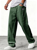 Men's relaxed wide-leg trousers with textured finish