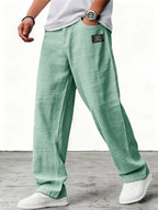 Men's relaxed wide-leg trousers with textured finish