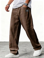 Men's relaxed wide-leg trousers with textured finish