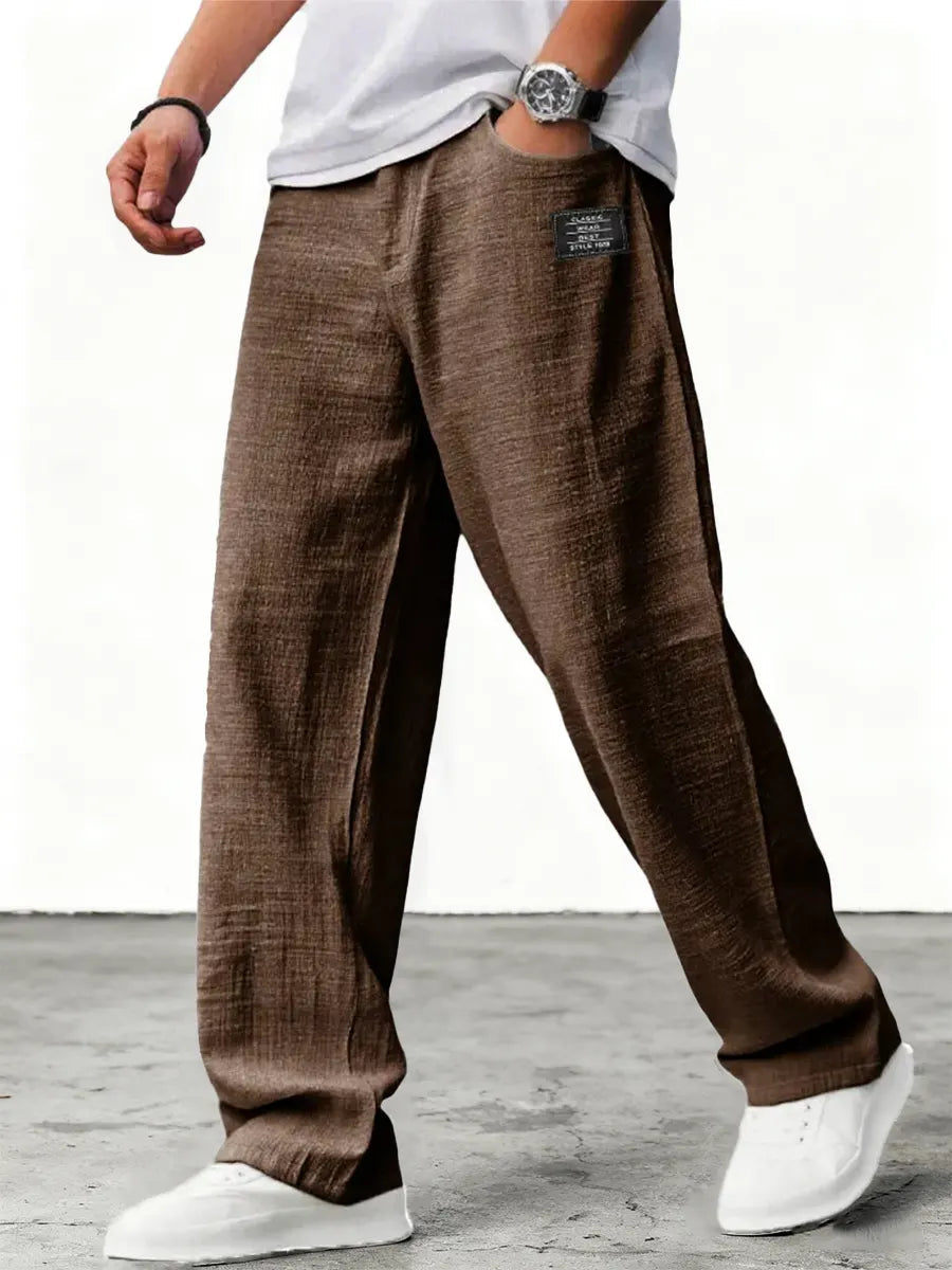 Men's relaxed wide-leg trousers with textured finish
