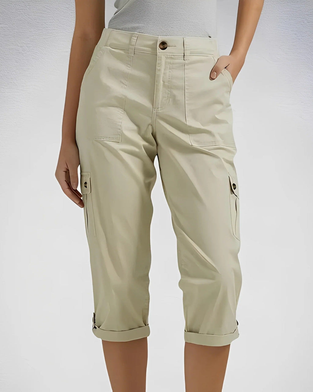 Women's high-waisted cropped cargo trousers with straight legs and multiple flap pockets