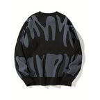 Women's oversized abstract patterned crew neck sweater with long sleeves