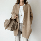 Women's longline button front cardigan with round neckline and long sleeves