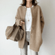 Women's longline button front cardigan with round neckline and long sleeves