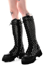 Women's black knee-high lace-up boots with silver studs and lugged soles
