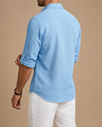 Men's long-sleeved textured polo shirt with button placket and roll-up sleeve tabs