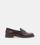 Women's dark brown glossy penny loafers with rounded toes and low block heels