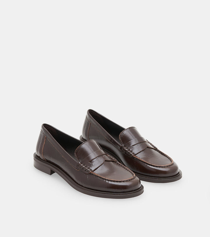 Women's dark brown glossy penny loafers with rounded toes and low block heels