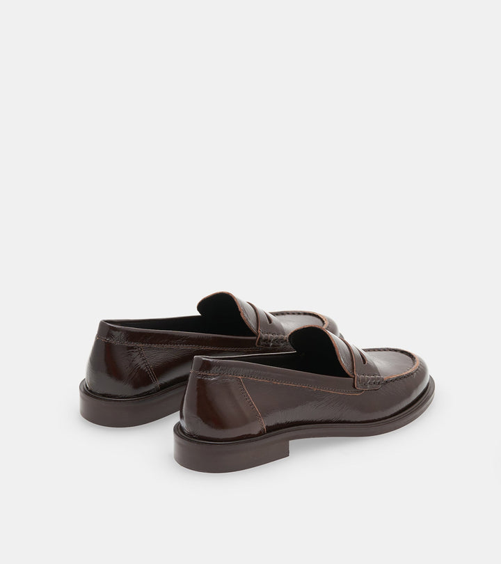 Women's dark brown glossy penny loafers with rounded toes and low block heels