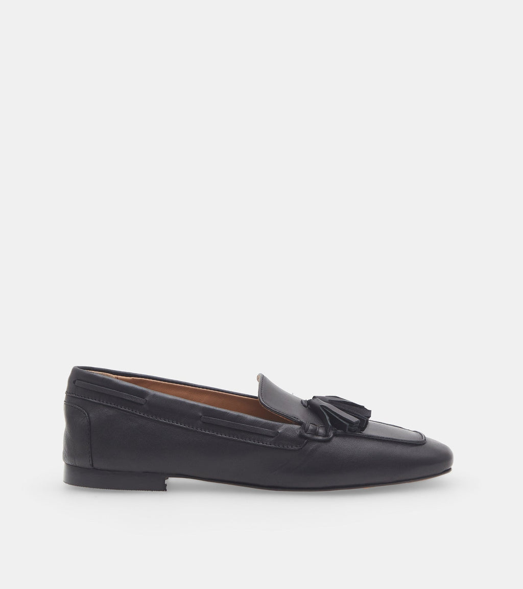 Women's black slip-on loafers with tassel detailing and flat heels